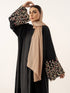 CHRISTINA ABAYA