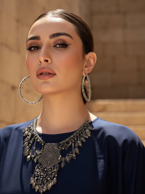 أتساءل الهروب من القفطان